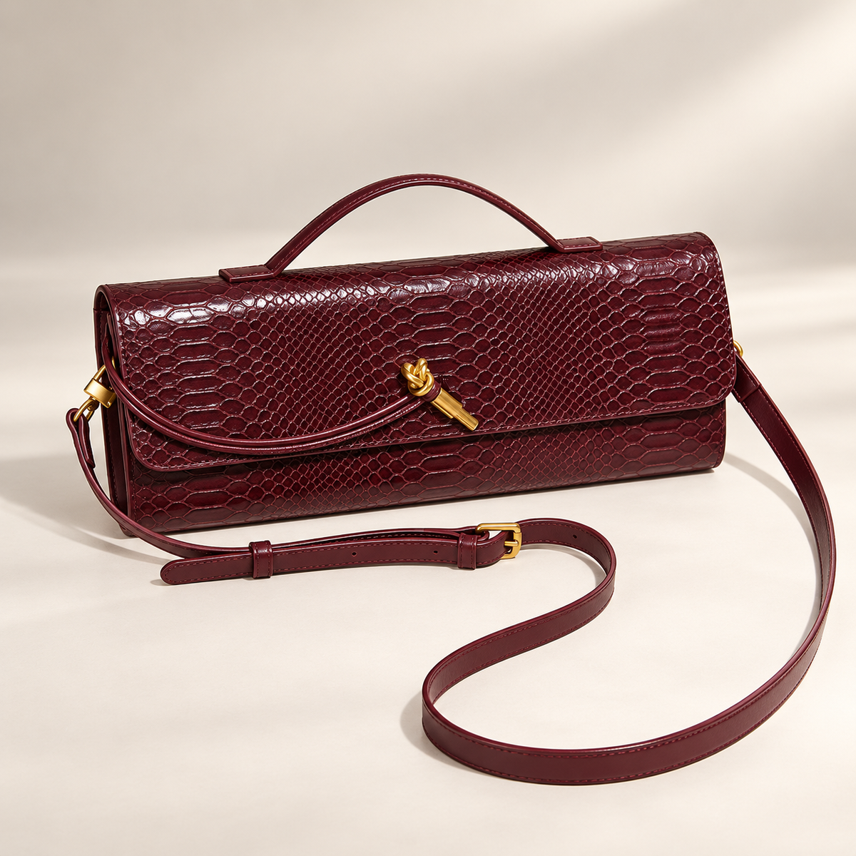 Camille Reptile-Embossed Top Handle Clutch Bag