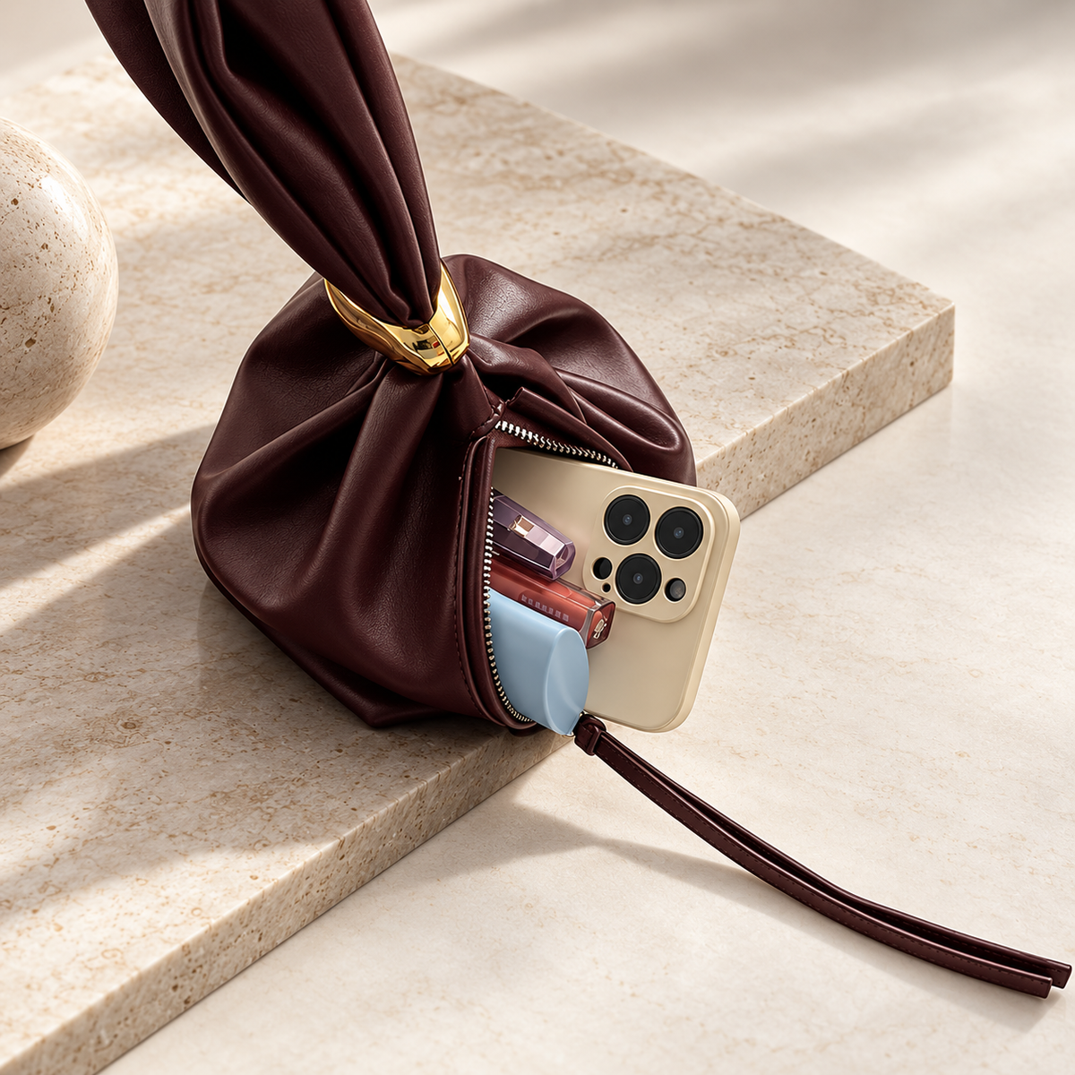 Alessia Sculpted Knot Pouch Bag with Gold-Tone Ring